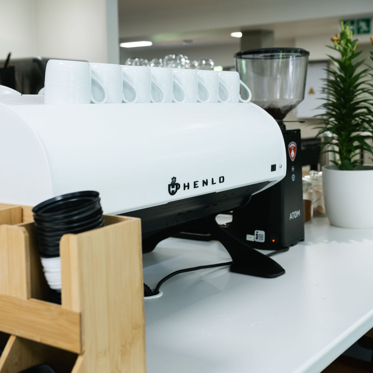 Henlo RS double group head commercial espresso machine in white on bar